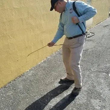 Best Pest Pro technician inspecting property